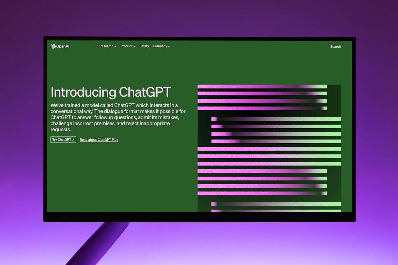 services-01 OpenAI Website with Introduction to ChatGPT on Computer Monitor